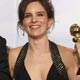 Irish actor Collin Farrell holds his award for Best Performance by an Actor in a Motion Picture - Musical Or Comedy at the Golden Globe awards in Beverly Hills